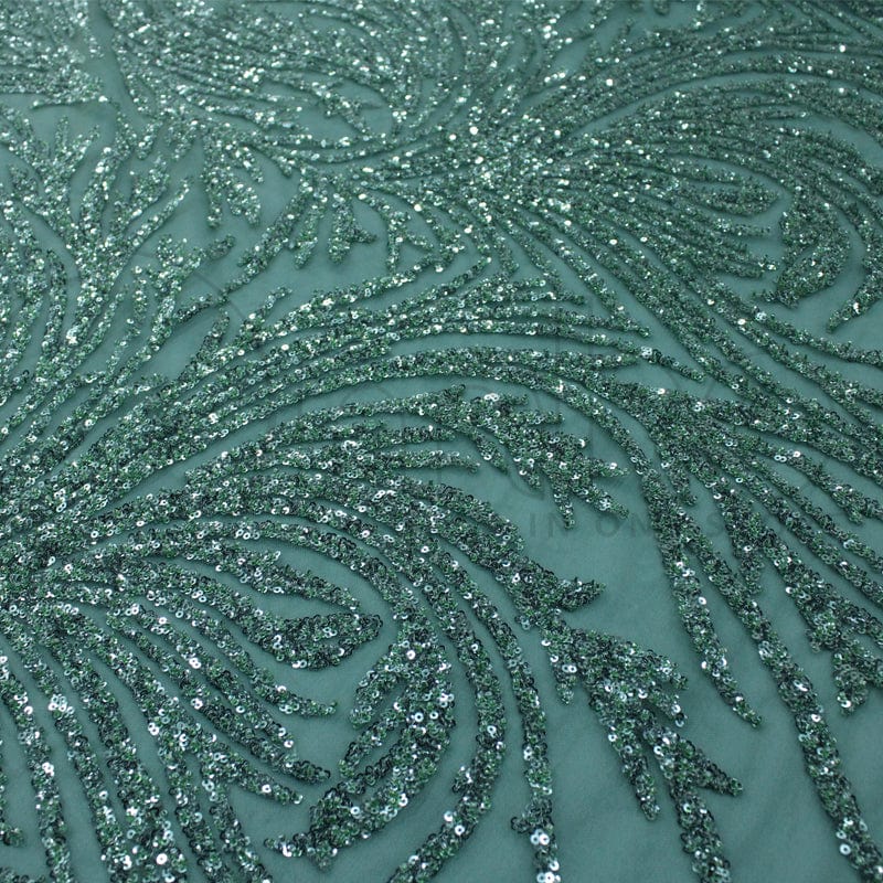 Green beaded shop lace fabric